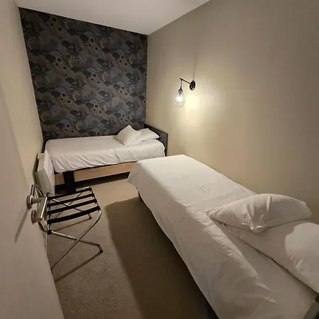 Au Loup Historic Aparthotel Bayeux